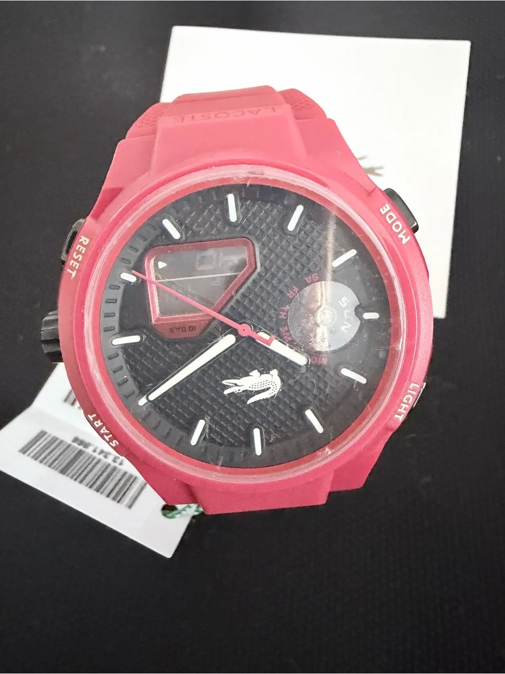 Brand new Lacoste Unisex Analog & Digital Watch in red with black dial.